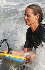 HELEN HUNT in Wetsuit Bodyboarding at a Beach in Malibu 06/13/2020