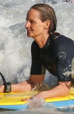 HELEN HUNT in Wetsuit Bodyboarding at a Beach in Malibu 06/13/2020