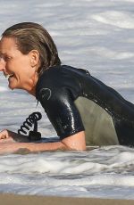 HELEN HUNT in Wetsuit Bodyboarding at a Beach in Malibu 06/13/2020