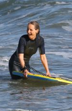 HELEN HUNT in Wetsuit Bodyboarding at a Beach in Malibu 06/13/2020