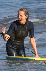 HELEN HUNT in Wetsuit Bodyboarding at a Beach in Malibu 06/13/2020