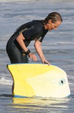 HELEN HUNT in Wetsuit Bodyboarding at a Beach in Malibu 06/13/2020