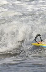 HELEN HUNT in Wetsuit Bodyboarding at a Beach in Malibu 06/13/2020