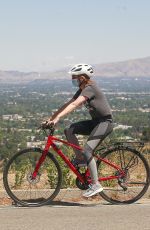 ISLA FISHER Riding Ber Bike Out in Los Angeles 06/07/2020