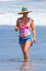 KATE HUDSON in Swimsuit and Denim Shorts Out on the Beach in Malibu 06/22/2020