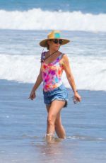 KATE HUDSON in Swimsuit and Denim Shorts Out on the Beach in Malibu 06/22/2020