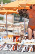 MICHELLE HUNZIKER in Bikini at a Beach in Varigotti 06/24/2020