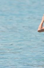 MICHELLE HUNZIKER in Bikini at a Beach in Varigotti 06/28/2020