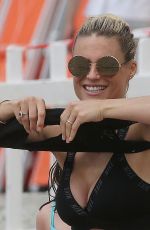 MICHELLE HUNZIKER in Bikini Top and Shorts at a Beach in Varigotti 06/06/2020