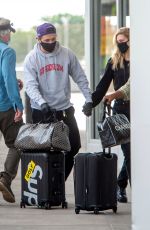 NICOLA PELTZ and Brooklyn Beckham at JFK AIrport in New York 06/25/2020