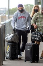 NICOLA PELTZ and Brooklyn Beckham at JFK AIrport in New York 06/25/2020