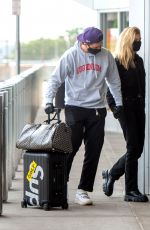 NICOLA PELTZ and Brooklyn Beckham at JFK AIrport in New York 06/25/2020