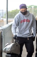 NICOLA PELTZ and Brooklyn Beckham at JFK AIrport in New York 06/25/2020