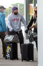 NICOLA PELTZ and Brooklyn Beckham at JFK AIrport in New York 06/25/2020