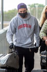 NICOLA PELTZ and Brooklyn Beckham at JFK AIrport in New York 06/25/2020