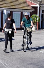 Pregnant CHRISTINA SCHWARZENEGGER Riding Her Bike Out in Brentwood 06/09/2020
