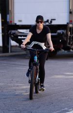 Pregnant CHRISTINA SCHWARZENEGGER Riding Her Bike Out in Brentwood 06/09/2020