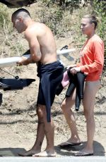 ROBIN WRIGHT and Clement Giraudet Surfing in Malibu 06/12/2020