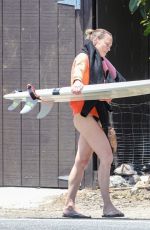 ROBIN WRIGHT Surfing at a Beach in Malibu 06/12/2020