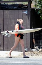 ROBIN WRIGHT Surfing at a Beach in Malibu 06/12/2020