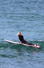 ROBIN WRIGHT Surfing at a Beach in Malibu 06/12/2020