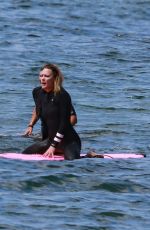 ROBIN WRIGHT Surfing at a Beach in Malibu 06/12/2020