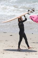 ROBIN WRIGHT Surfing at a Beach in Malibu 06/12/2020