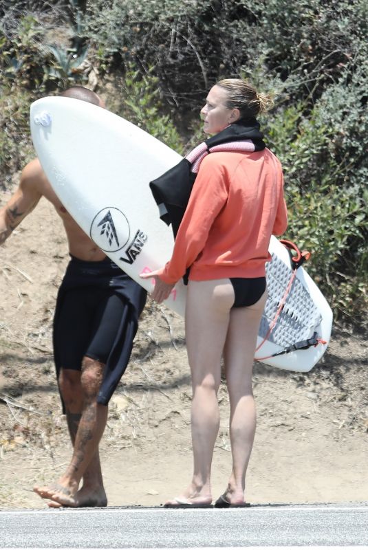 ROBIN WRIGHT Surfing at a Beach in Malibu 06/12/2020