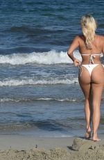 AMBER TURNER in a White Bikini at a Beach in Spain 07/19/2020