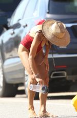 BETHENNY FRANKEL in a Red Swimsuit at a Beach in Hamptons 07/29/2020
