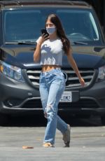 CAMILA MORRONE in Ripped Denim at Norman