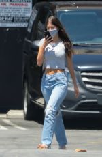 CAMILA MORRONE in Ripped Denim at Norman