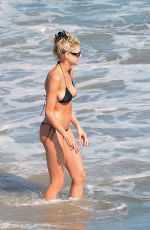 CHARLOTTE MCKINNEY in Bikini at a Beach in Malibu 07/26/2020