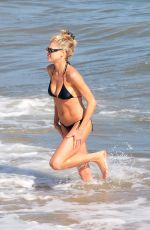 CHARLOTTE MCKINNEY in Bikini at a Beach in Malibu 07/26/2020