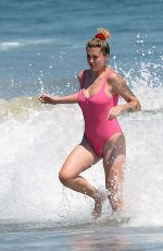 IRELAND BALDWIN in a Pink Swimsuit on the Beach in Malibu 07/20/2020