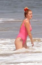 IRELAND BALDWIN in a Pink Swimsuit on the Beach in Malibu 07/20/2020