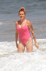 IRELAND BALDWIN in a Pink Swimsuit on the Beach in Malibu 07/20/2020