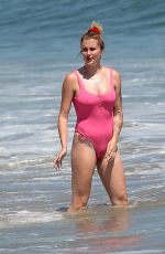 IRELAND BALDWIN in a Pink Swimsuit on the Beach in Malibu 07/20/2020