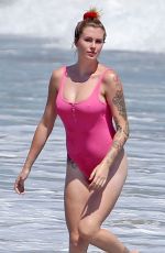 IRELAND BALDWIN in a Pink Swimsuit on the Beach in Malibu 07/20/2020