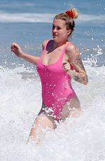 IRELAND BALDWIN in a Pink Swimsuit on the Beach in Malibu 07/20/2020
