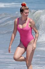 IRELAND BALDWIN in a Pink Swimsuit on the Beach in Malibu 07/20/2020