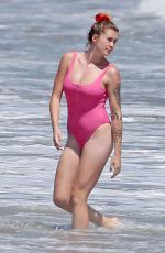 IRELAND BALDWIN in a Pink Swimsuit on the Beach in Malibu 07/20/2020