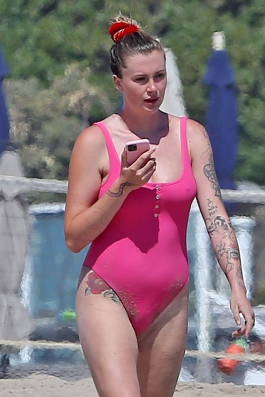 IRELAND BALDWIN in a Pink Swimsuit on the Beach in Malibu 07/20/2020