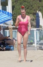 IRELAND BALDWIN in a Pink Swimsuit on the Beach in Malibu 07/20/2020