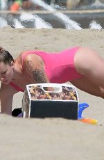 IRELAND BALDWIN in a Pink Swimsuit on the Beach in Malibu 07/20/2020