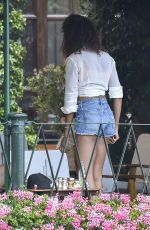 JOAN SMALLS in Denim Shorts in Portofino 07/23/2020