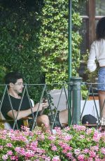 JOAN SMALLS in Denim Shorts in Portofino 07/23/2020