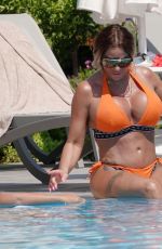 KATIE PRICE in Bikini at a Pool in Turkey 07/27/2020