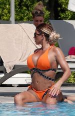 KATIE PRICE in Bikini at a Pool in Turkey 07/27/2020