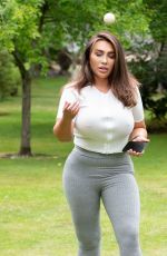 LAUREN GOODGER Playing with Her Do at a Park in Essex 07/27/2020